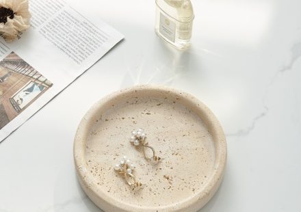 Small white marble round tray top-down view, compact size perfect for jewelry or keys