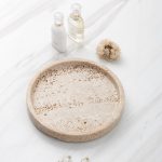 White marble round tray styled in a home setting, demonstrating how it elevates daily objects