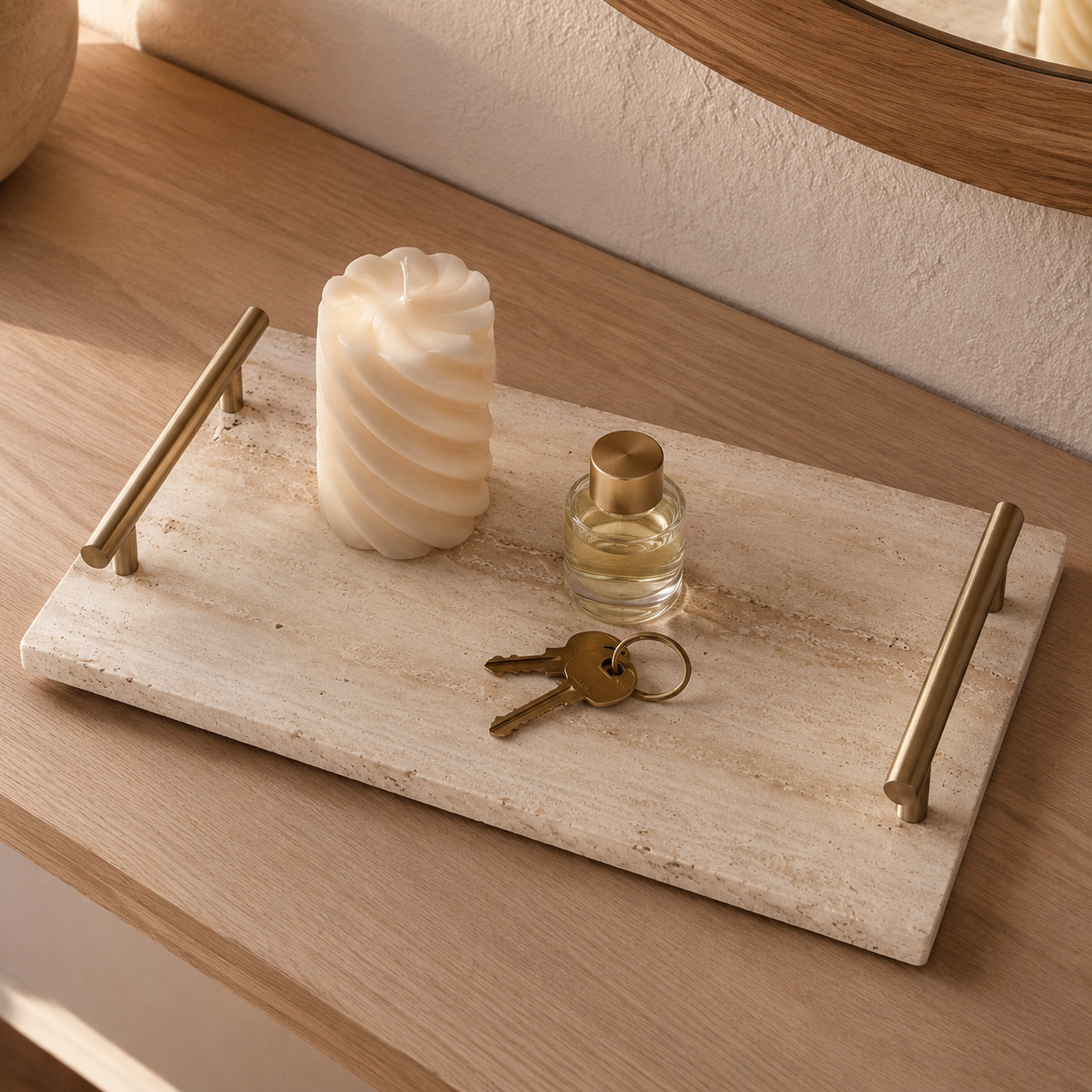 Travertine tray holding a diffuser and small objects